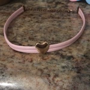 Pink choker with gold heart